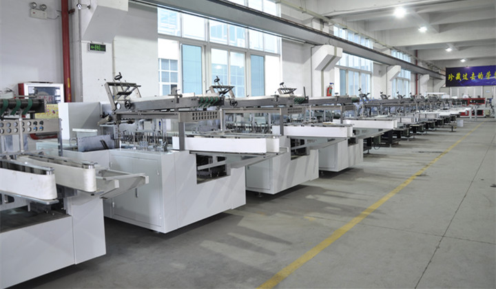 Which saves money, manual cartoning or automatic cartoning machine?